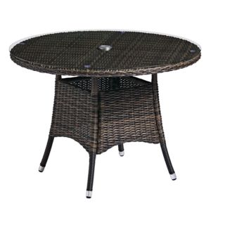 Clova Rattan dining table with toughened glass.